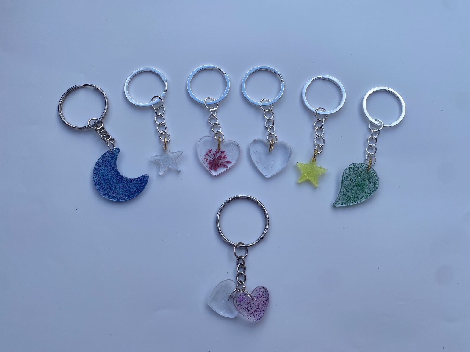 Handmade resin keyrings with moon, star, heart and leaf charms